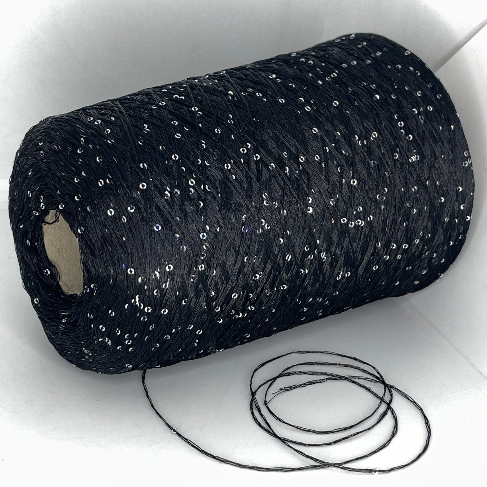 100% Poliamidas + Žvyneliai