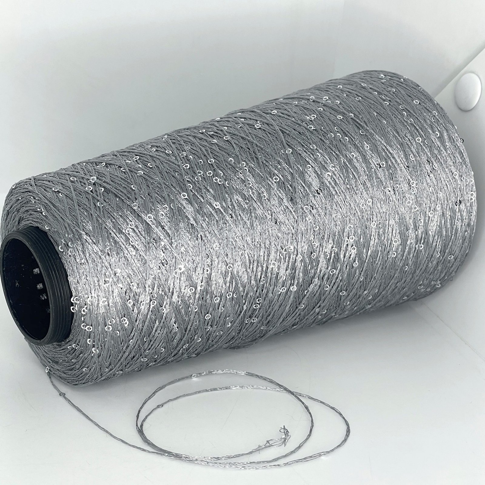 100% Poliamidas + Žvyneliai